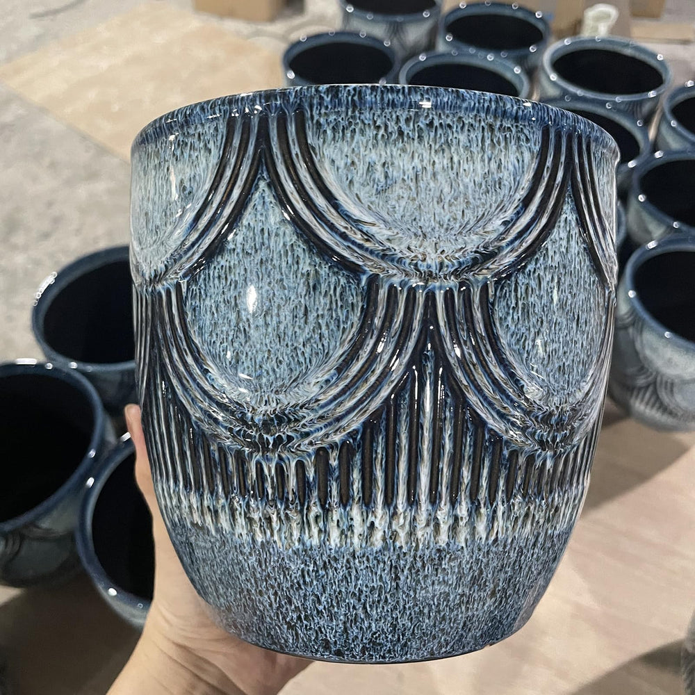 Chralji GIFTWARE blue planter on windowsill adding color and healthy plant display