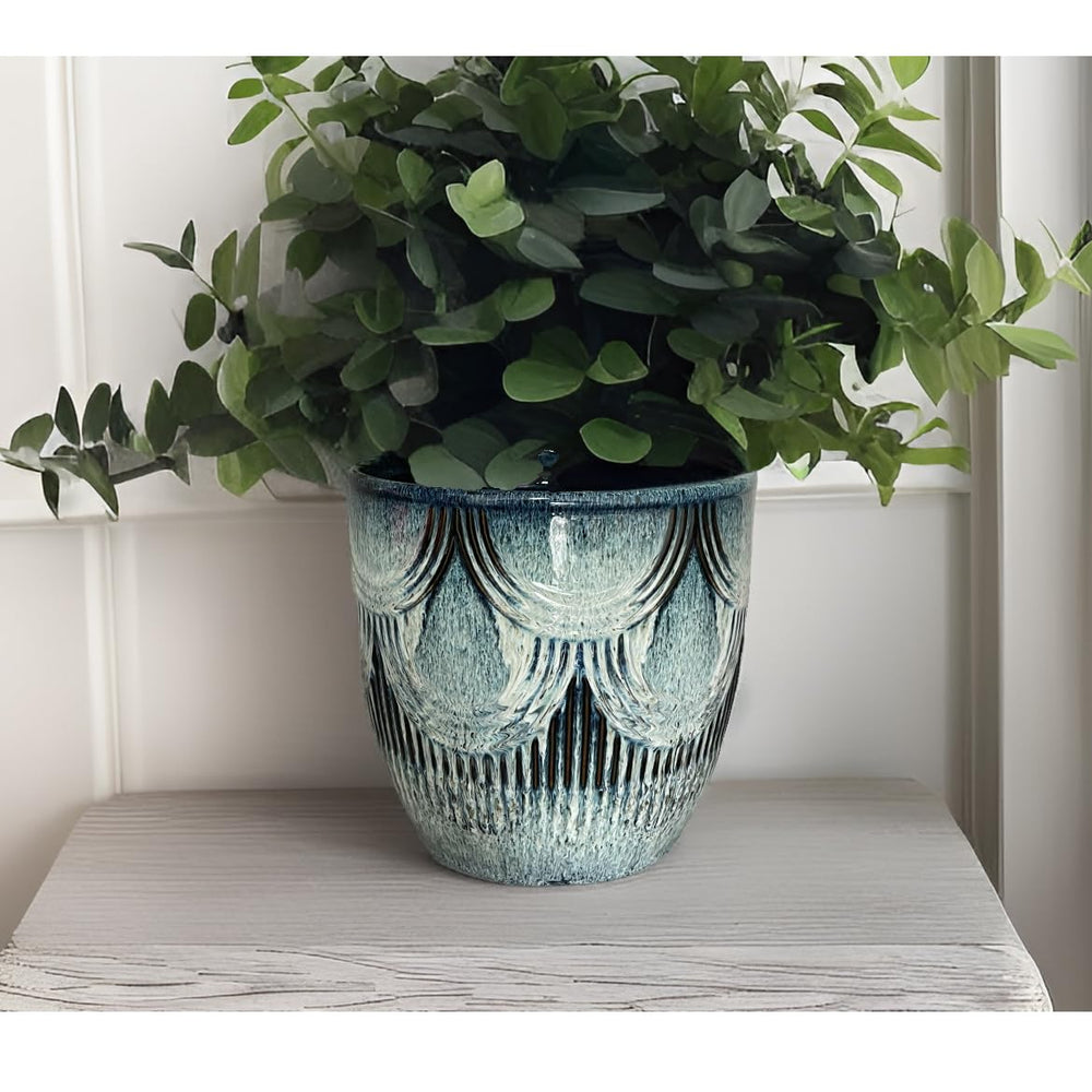 Chralji GIFTWARE pot held in hand for scale showing perfect desk size
