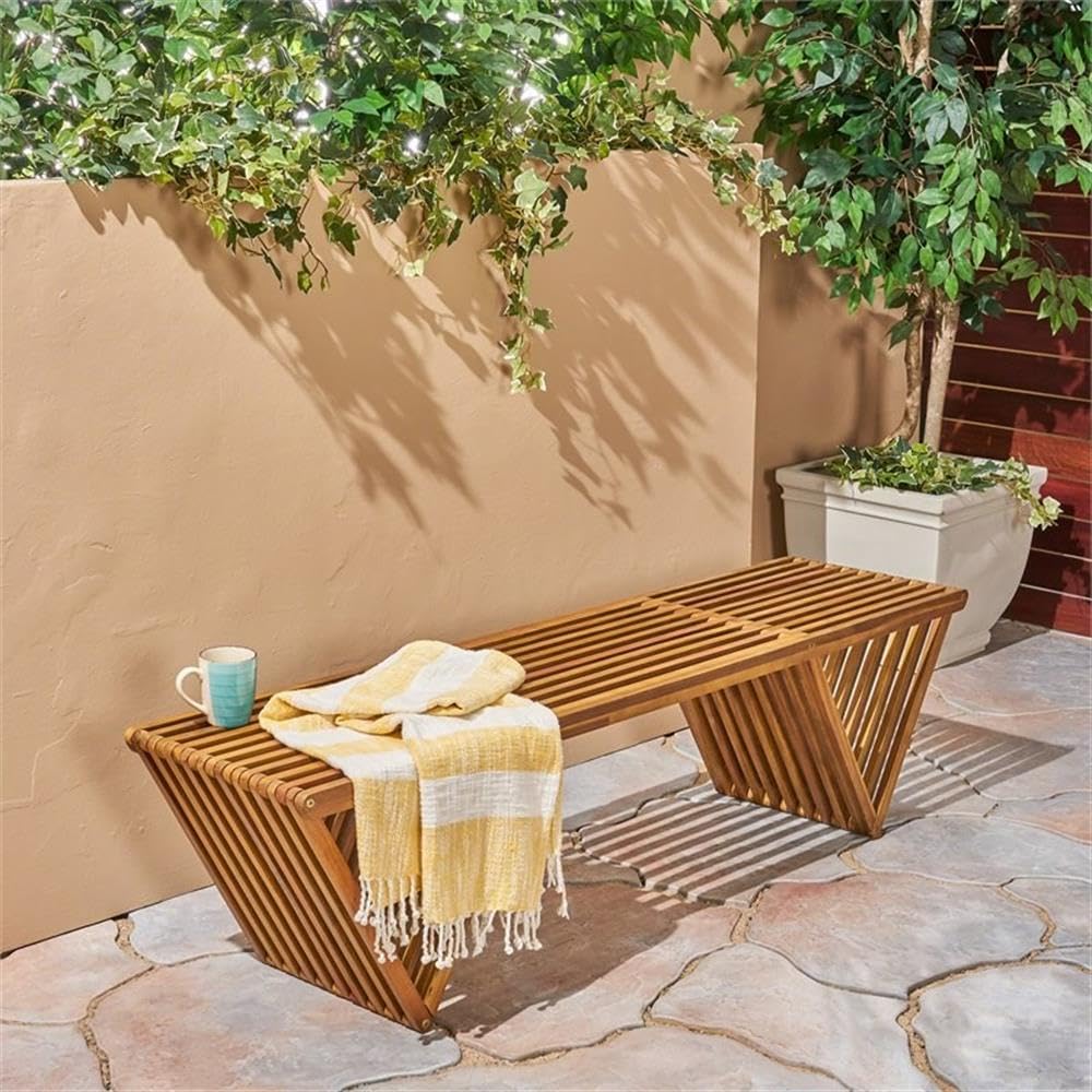 Christopher Knight Home bench styled with cushions for added comfort and color