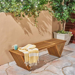 Christopher Knight Home bench styled with cushions for added comfort and color