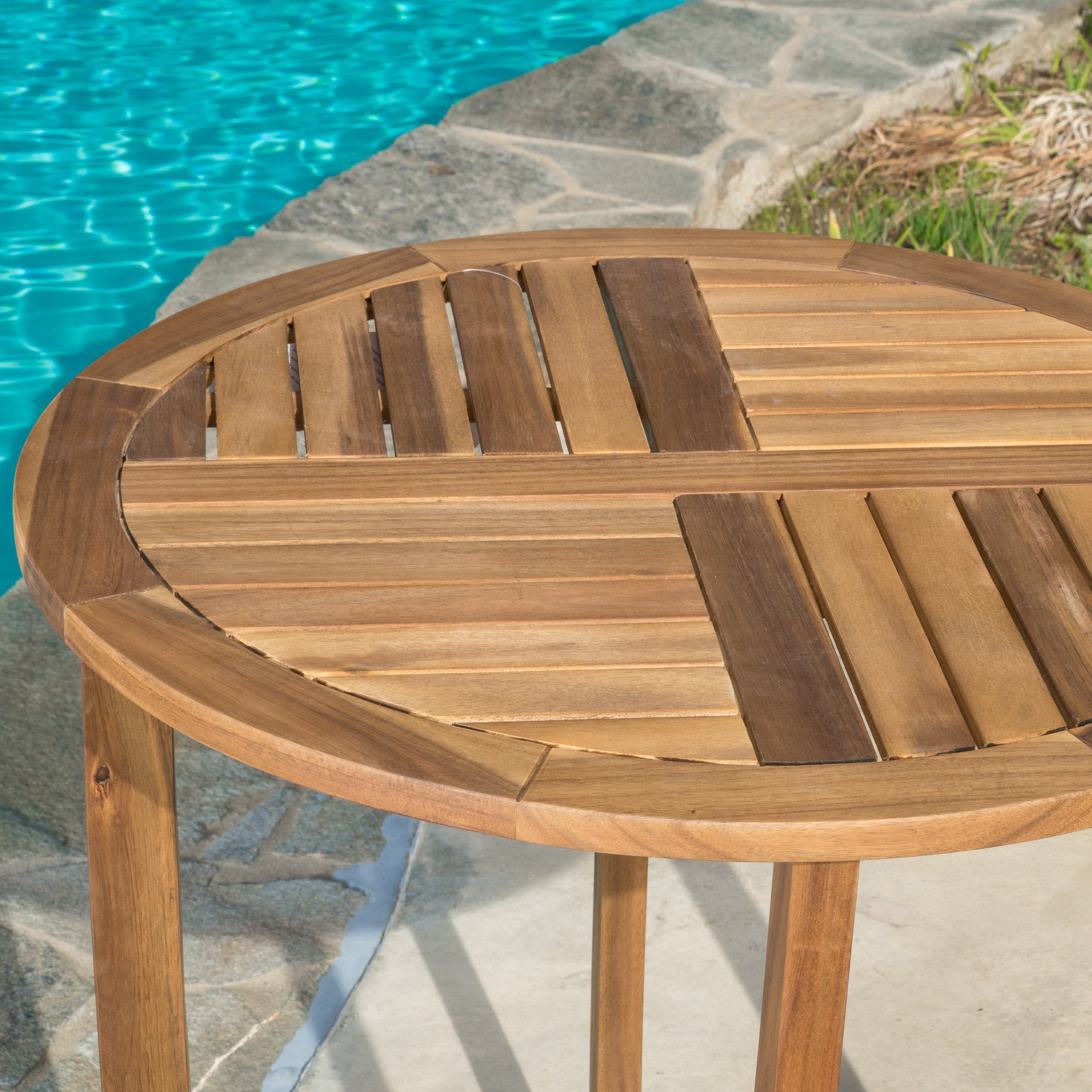 Christopher Knight Home bistro set styled on a balcony showcasing cozy outdoor ambiance