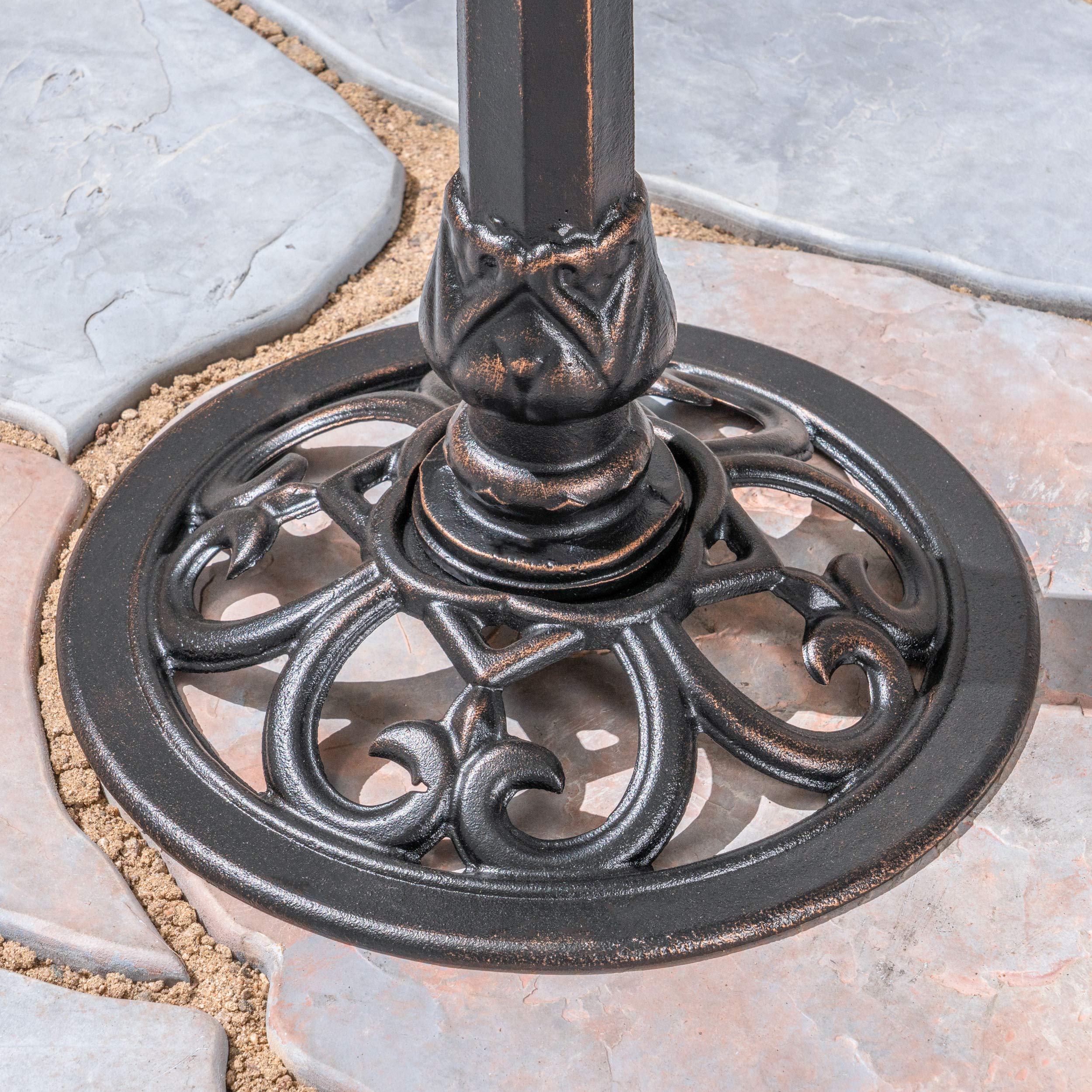 Christopher Knight Home bird bath placed in garden attracting birds and enhancing landscape