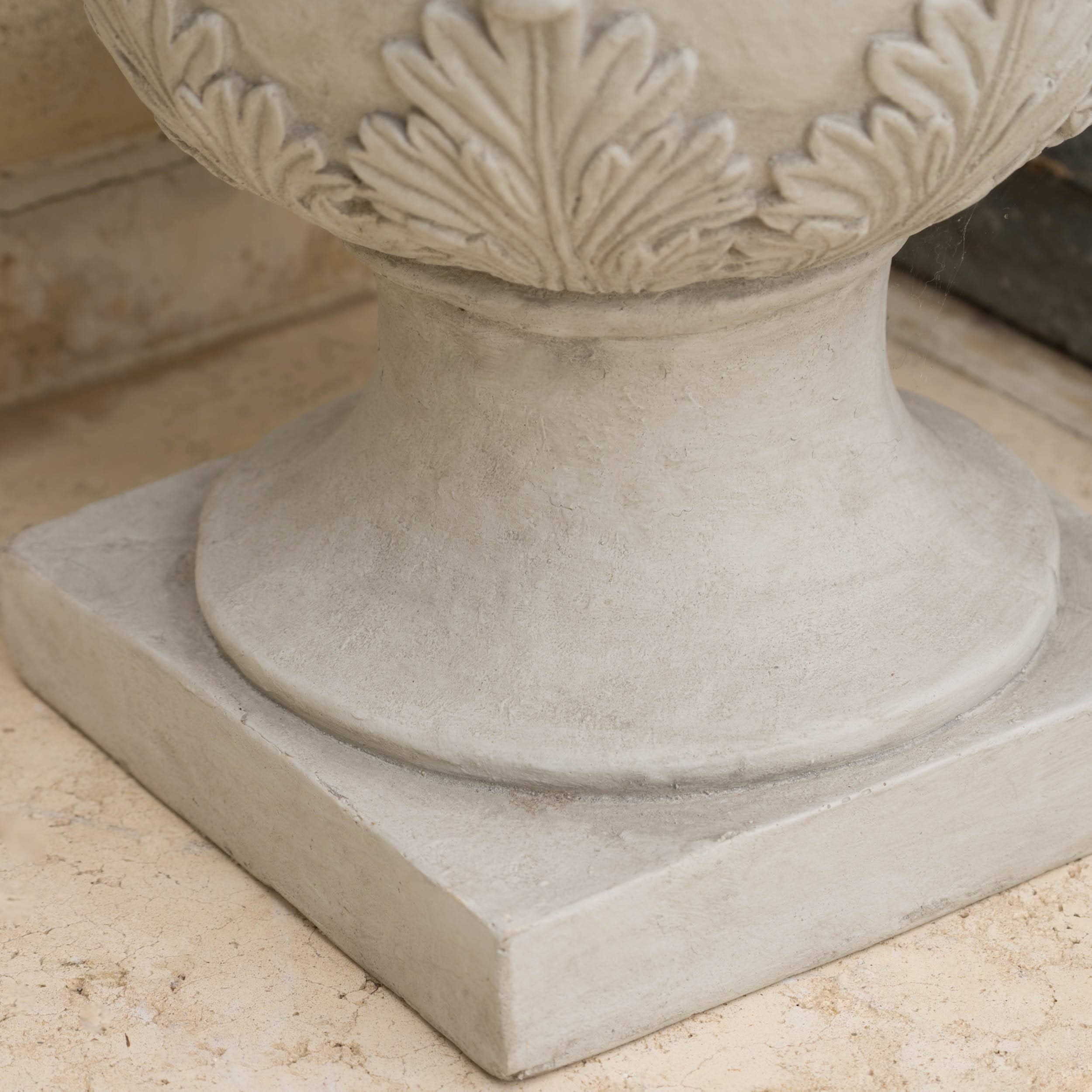 Christopher Knight Home urn on a porch illustrating outdoor suitability and curb appeal benefit