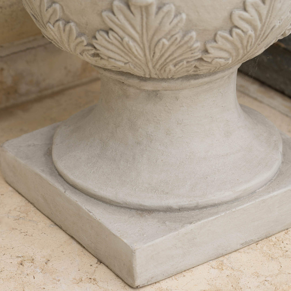 Christopher Knight Home urn on a porch illustrating outdoor suitability and curb appeal benefit