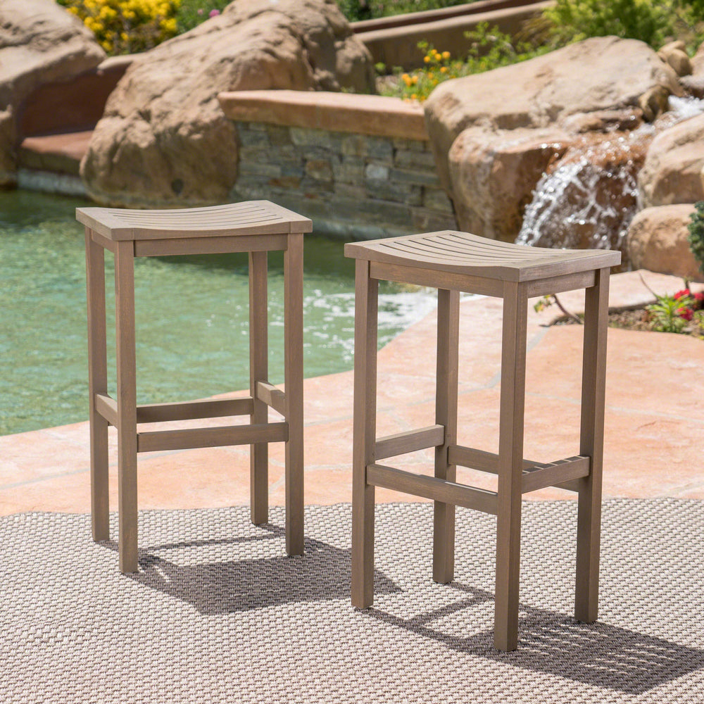 Christopher Knight Home two stools on a patio demonstrating stylish outdoor seating benefit