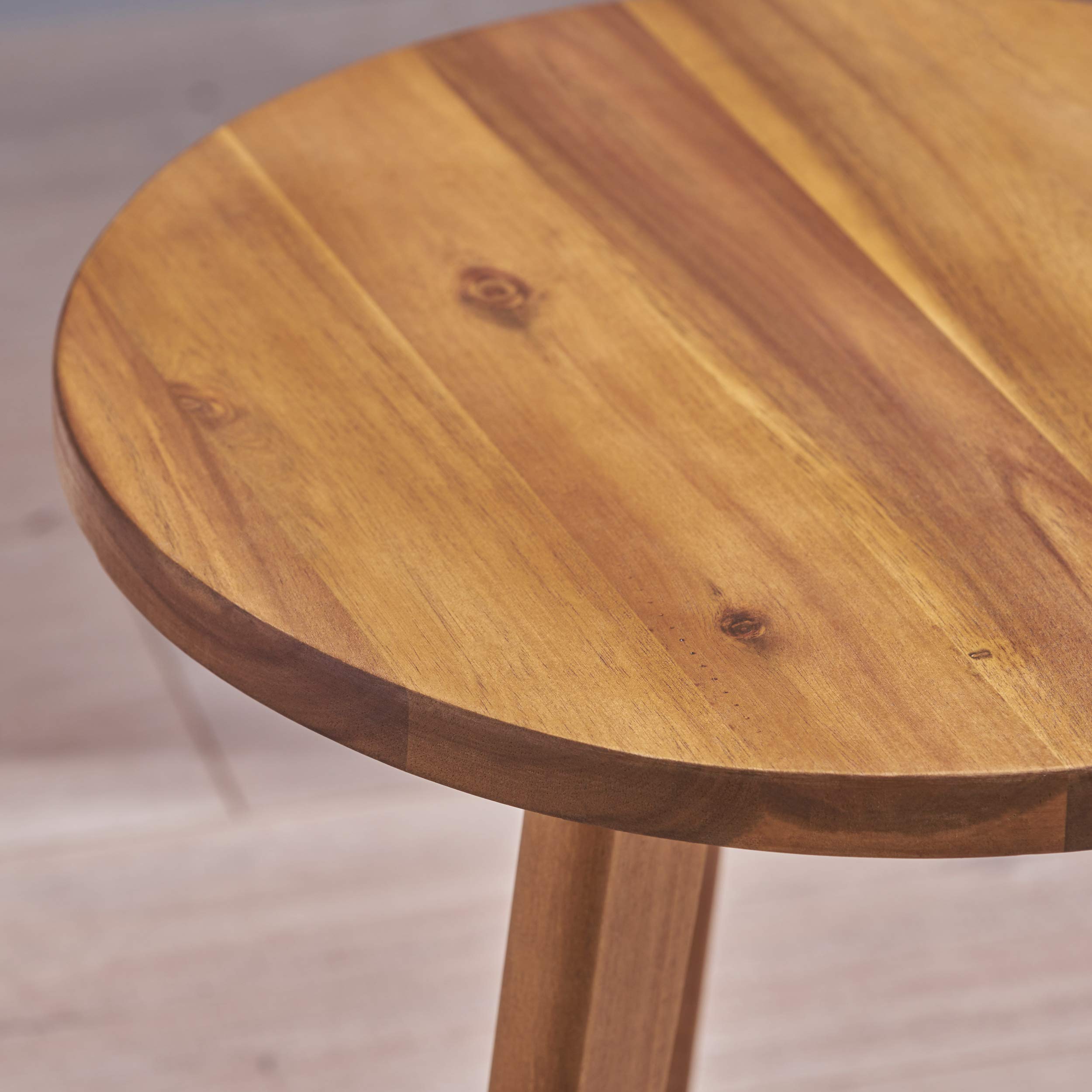 Christopher Knight Home Gino table holding chilled drinks showing functional surface for entertaining outdoors