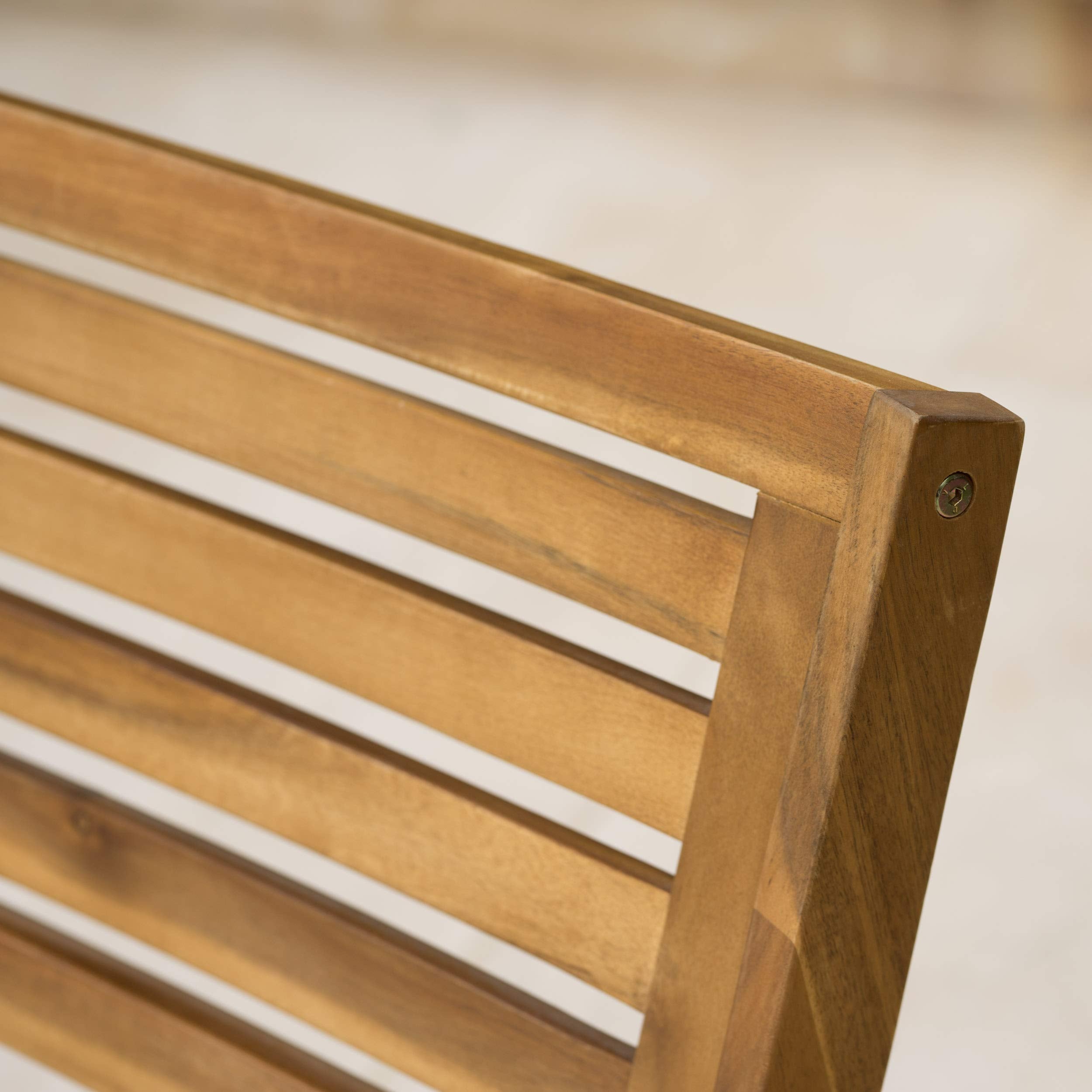 Christopher Knight Home chairs in a patio lifestyle scene demonstrating warm ambiance and entertaining benefit