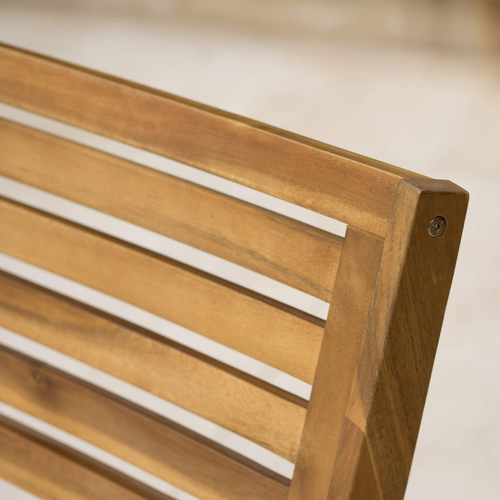 Christopher Knight Home chairs in a patio lifestyle scene demonstrating warm ambiance and entertaining benefit