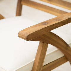 Christopher Knight Home side profile showing curved armrests and stable frame for comfortable outdoor posture