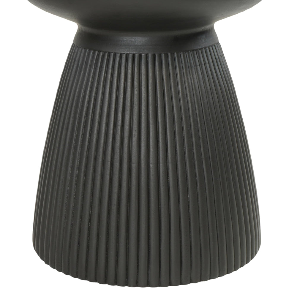 Christopher Knight Home table next to chair showing scale and easy portability