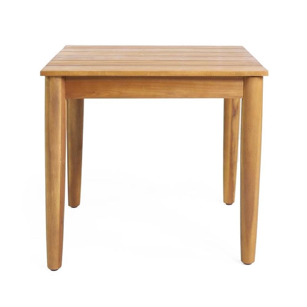 Christopher Knight Home table in evening setting highlighting warm teak ambience