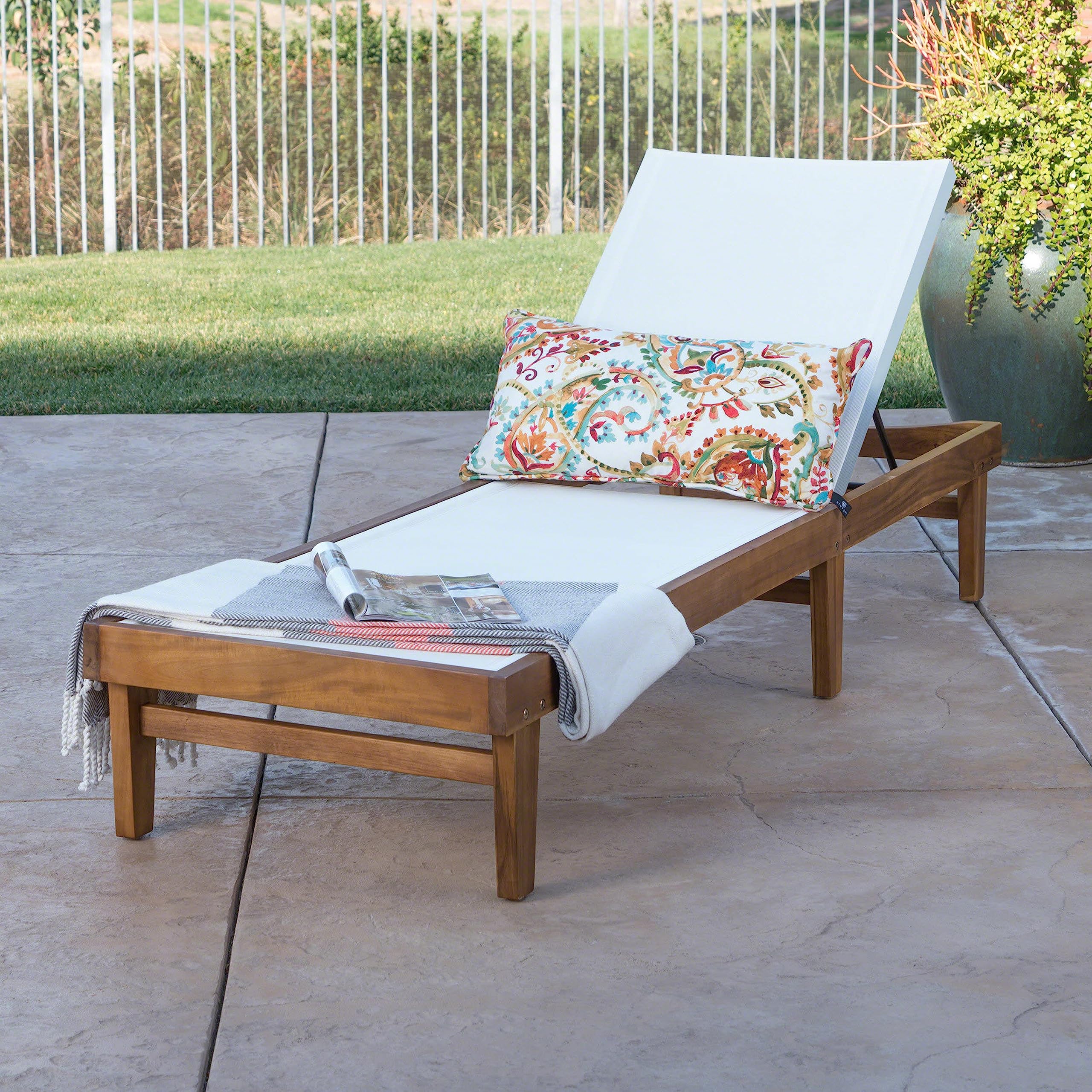 Christopher Knight Home side profile highlighting low-slung silhouette and supportive acacia frame for relaxed lounging