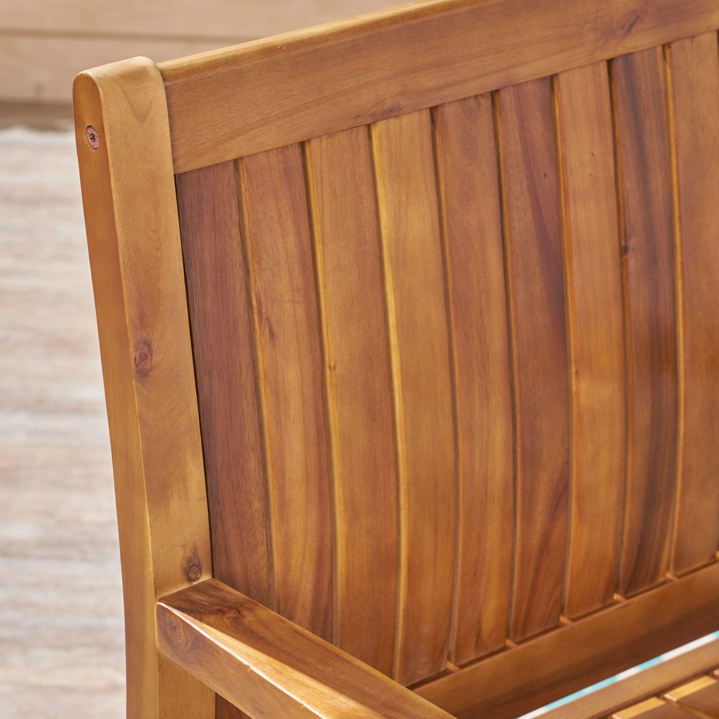 Christopher Knight Home chairs beside dining table to show size and fit for patio dining arrangements