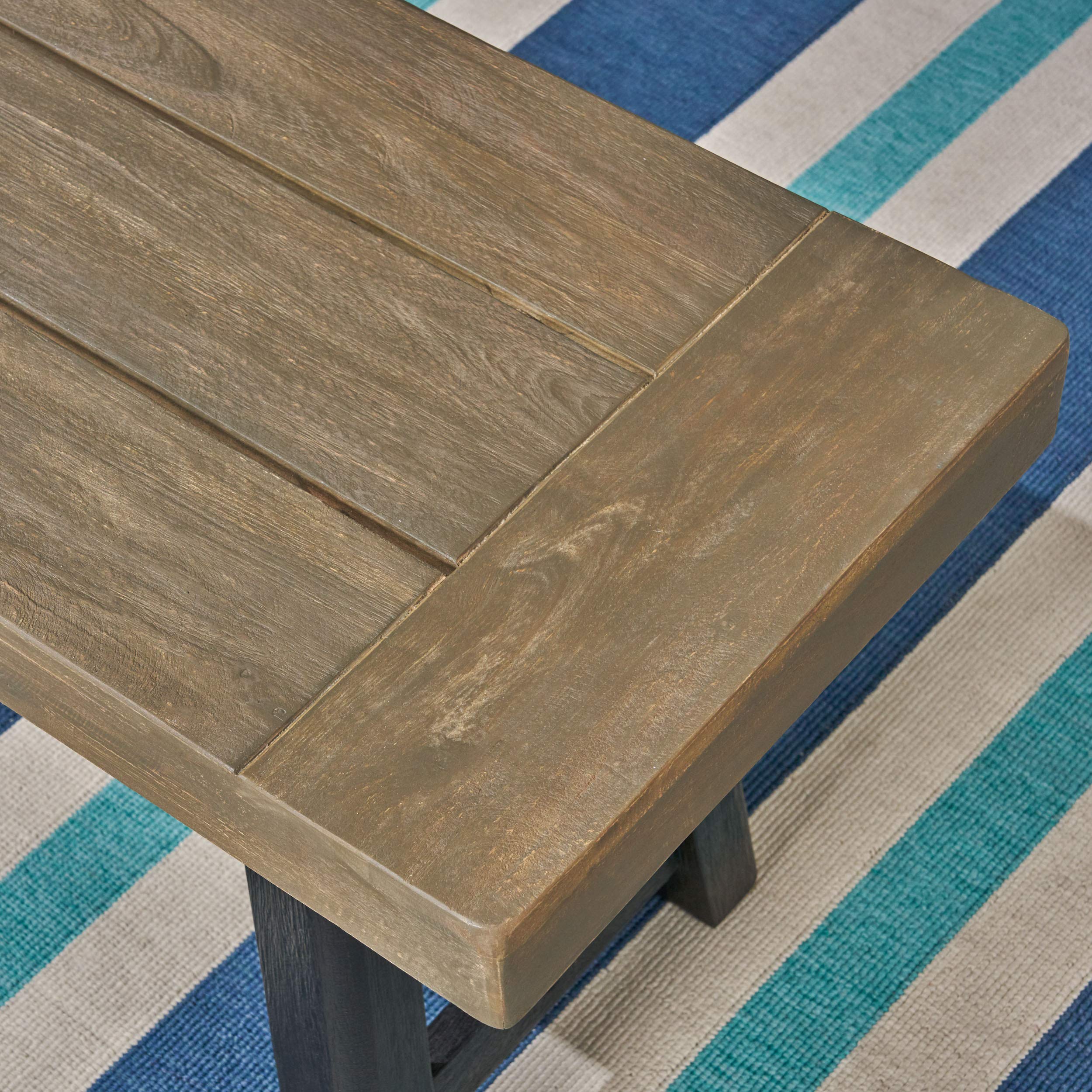 Christopher Knight Home seat close-up showing sandblasted texture and hand-finished acacia for visual character