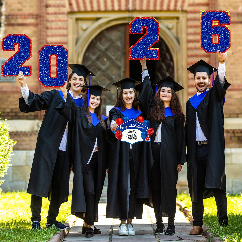 Chunful large GRAD and 2026 signs displayed for size clarity