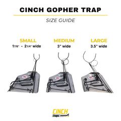 Cinch TRAPS SINCE 1909 trap next to a hand for scale to show compact size and easy handling