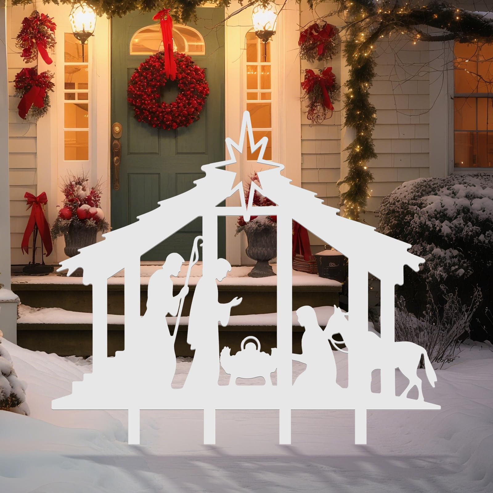 Cinnvoice nativity installed in a yard with spotlight showing strong nighttime visibility