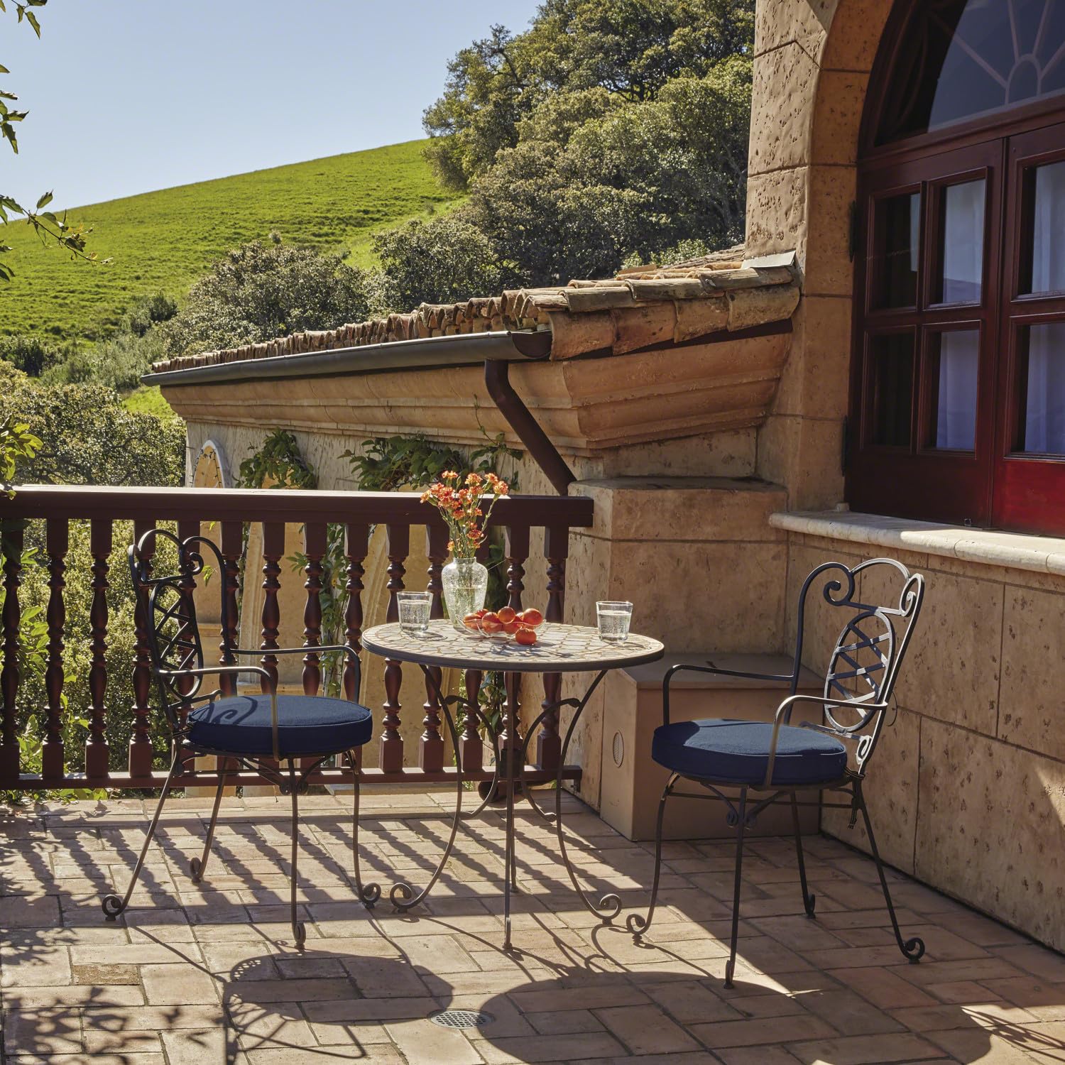 Classic Accessories Montlake placed on outdoor loveseat showing fit and upgraded seating comfort