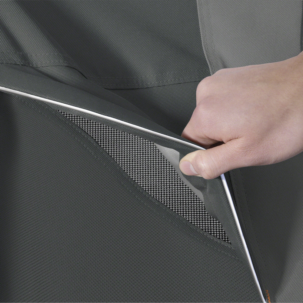 Classic Accessories tension strap and click-close panel securing cover against wind