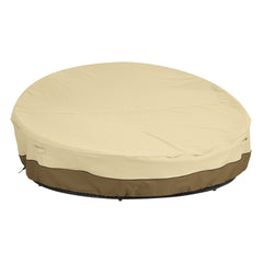 Classic Accessories front view of cover protecting a round daybed outdoors, keeps furniture dry
