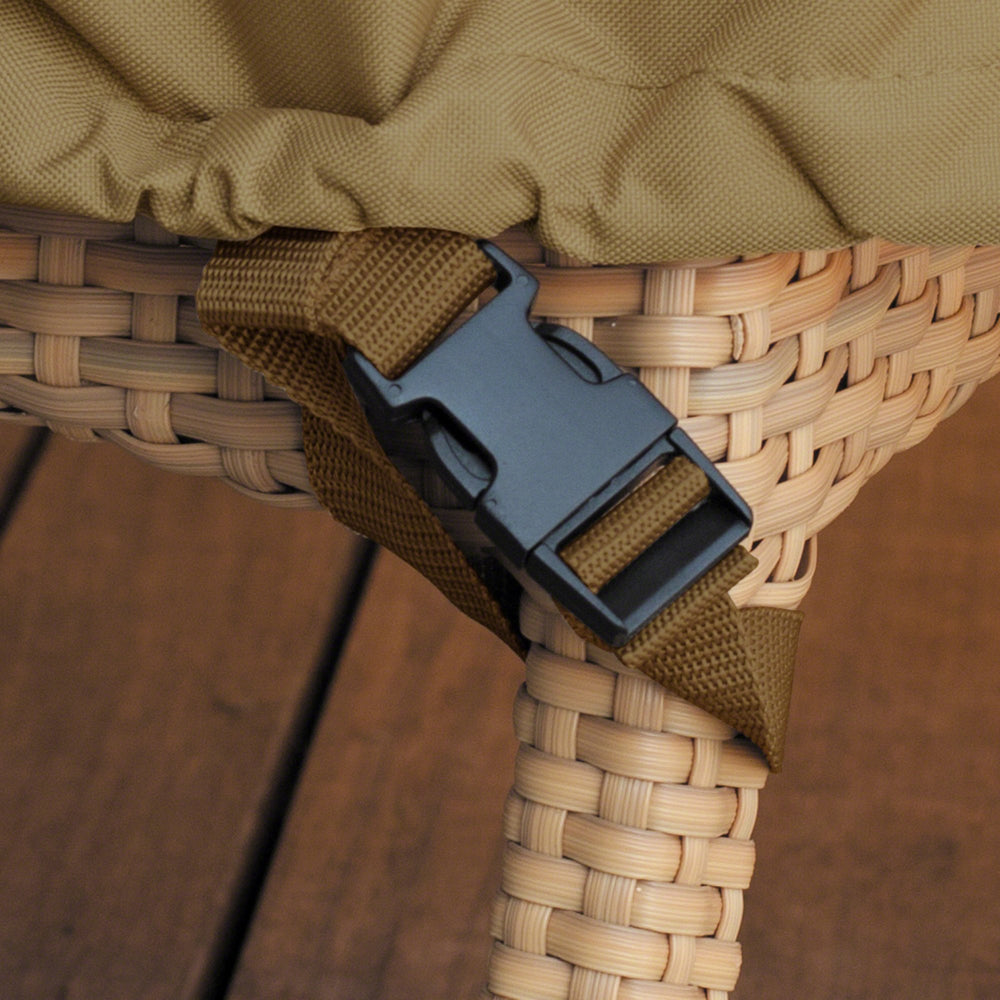 Classic Accessories cover secured on fire pit table with straps, prevents wind lofting