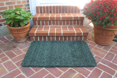 CLEAN MACHINE mat in use at doorway trapping mud for cleaner floors
