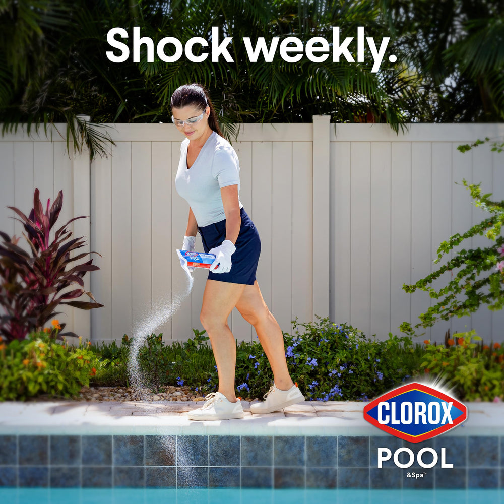 Clorox Pool&Spa pouring granules into pool deep end for quick treatment