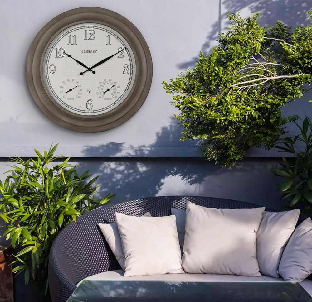 CLXEAST clock on patio showing size comparison and outdoor placement benefit