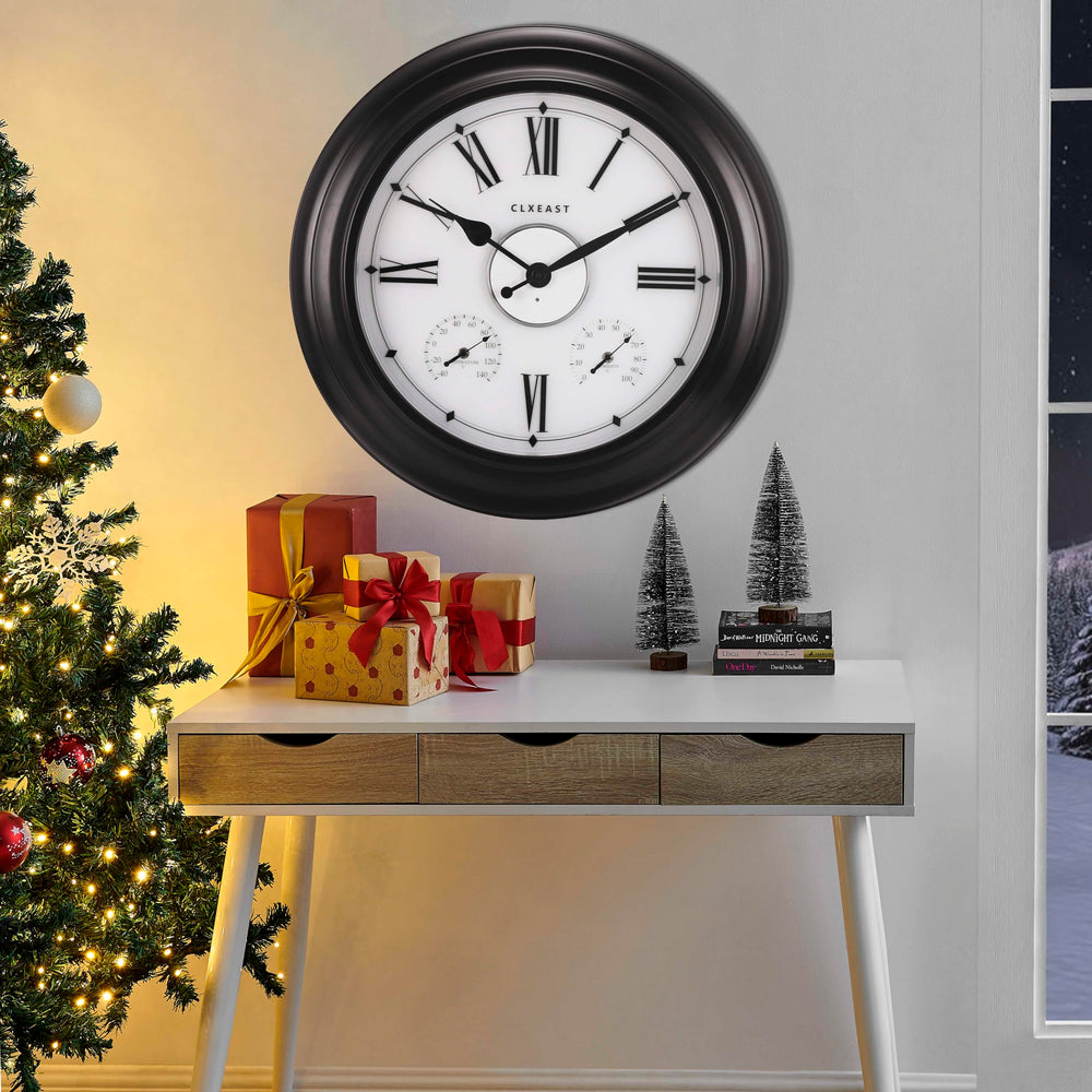 CLXEAST battery compartments open showing separate power for clock and LED light