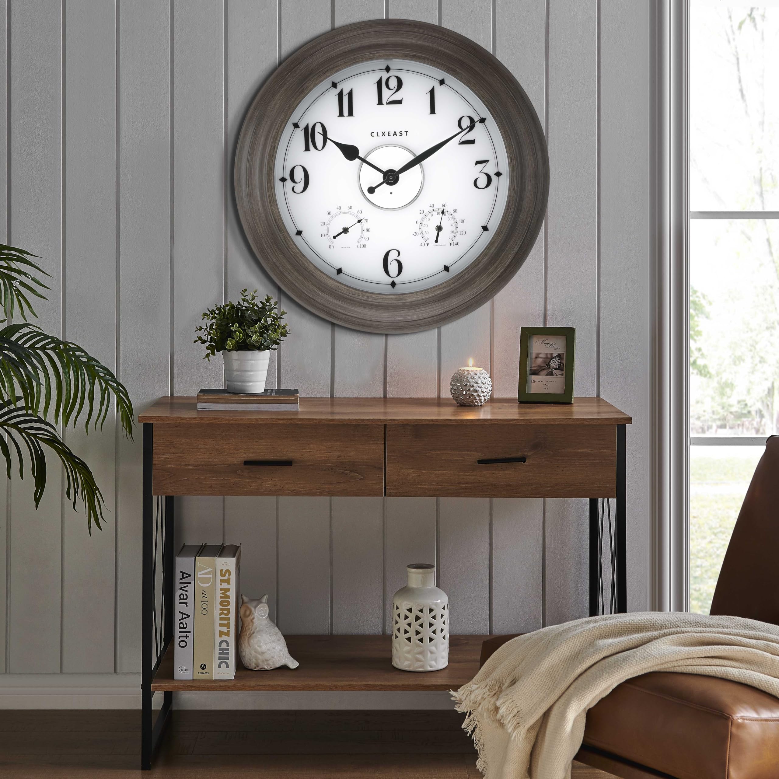 CLXEAST nighttime porch scene with illuminated clock for ambient light
