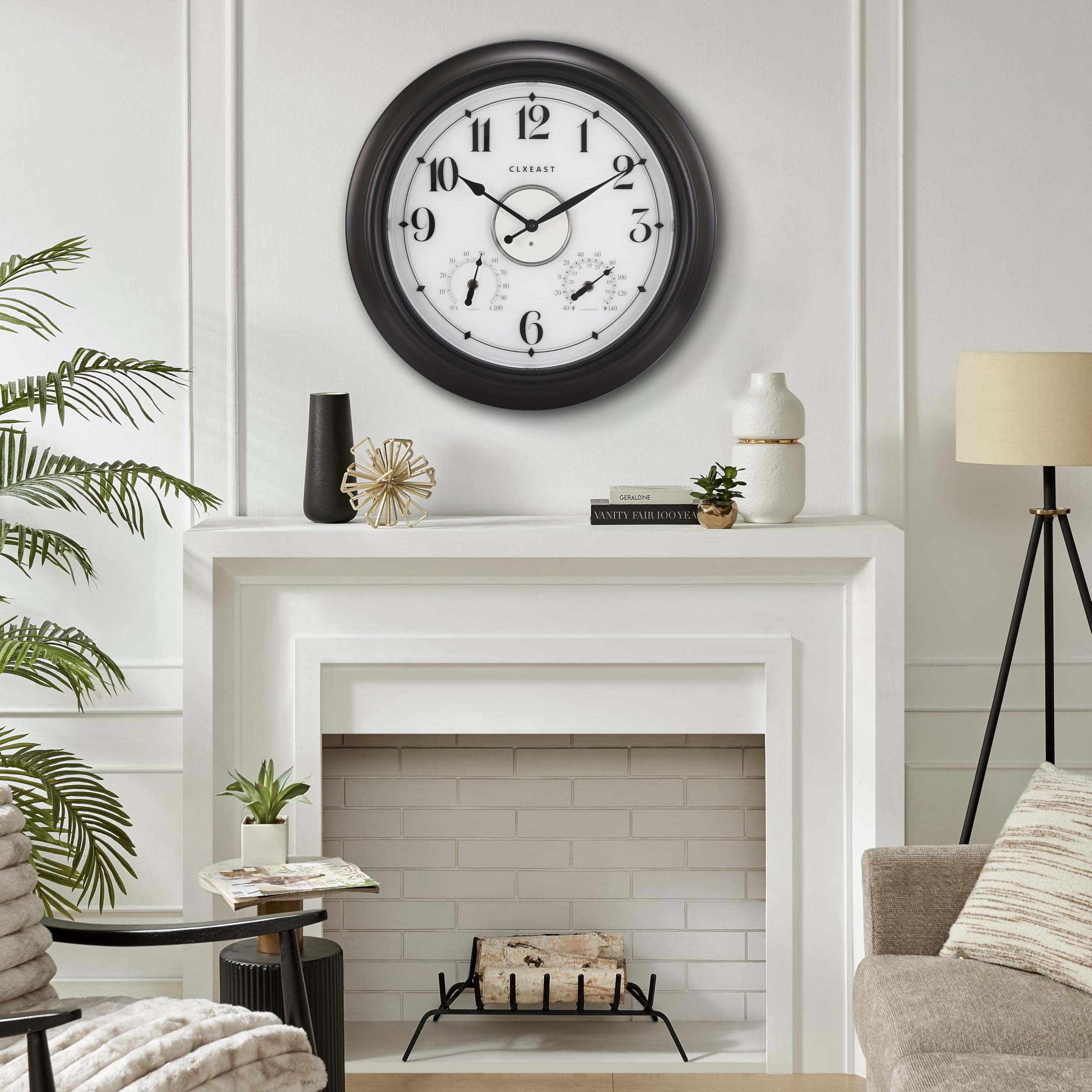 CLXEAST next to chair for scale to show the 18-inch large clock size advantage