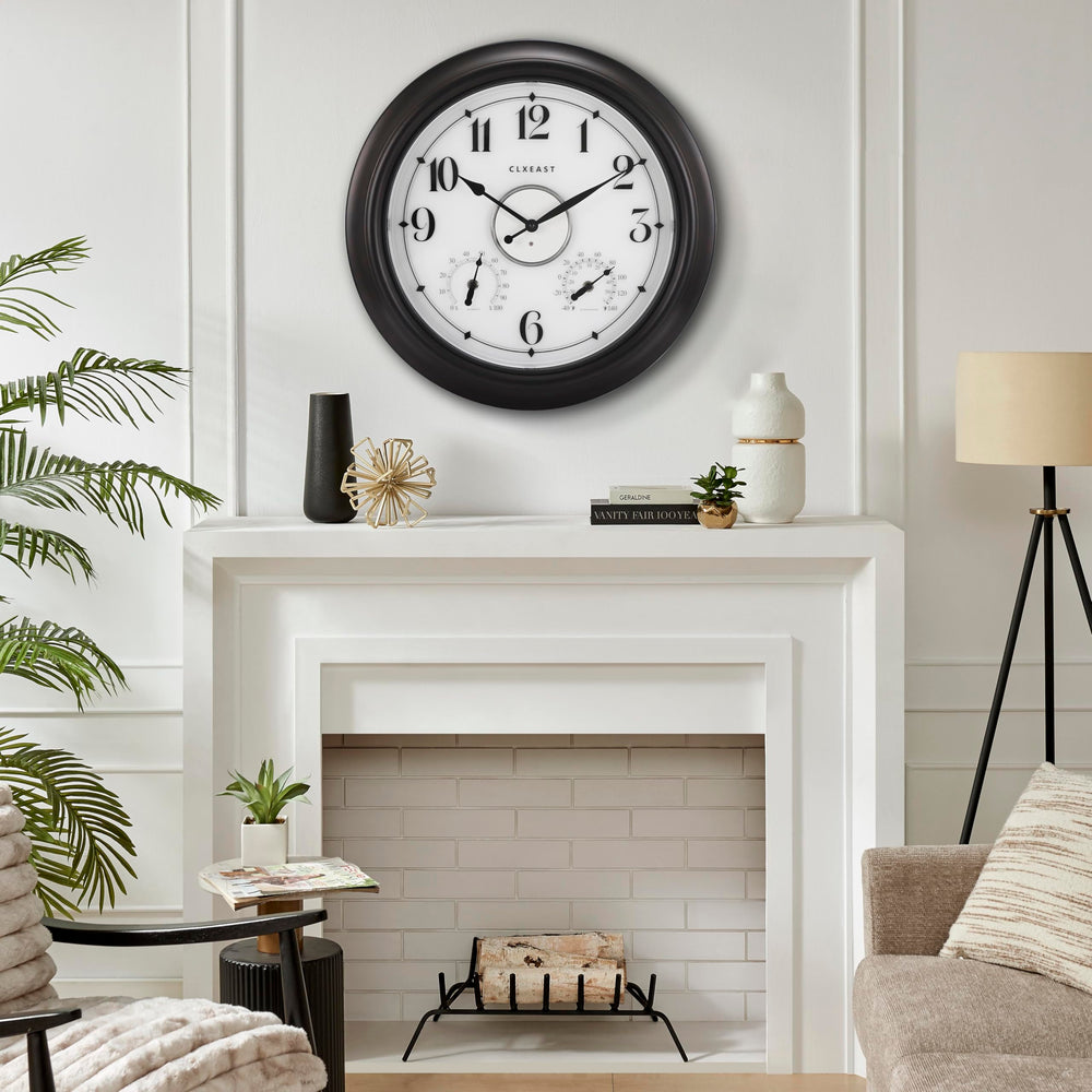CLXEAST next to chair for scale to show the 18-inch large clock size advantage
