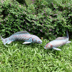 CLYB koi sculptures mounted in garden displaying quick installation and height