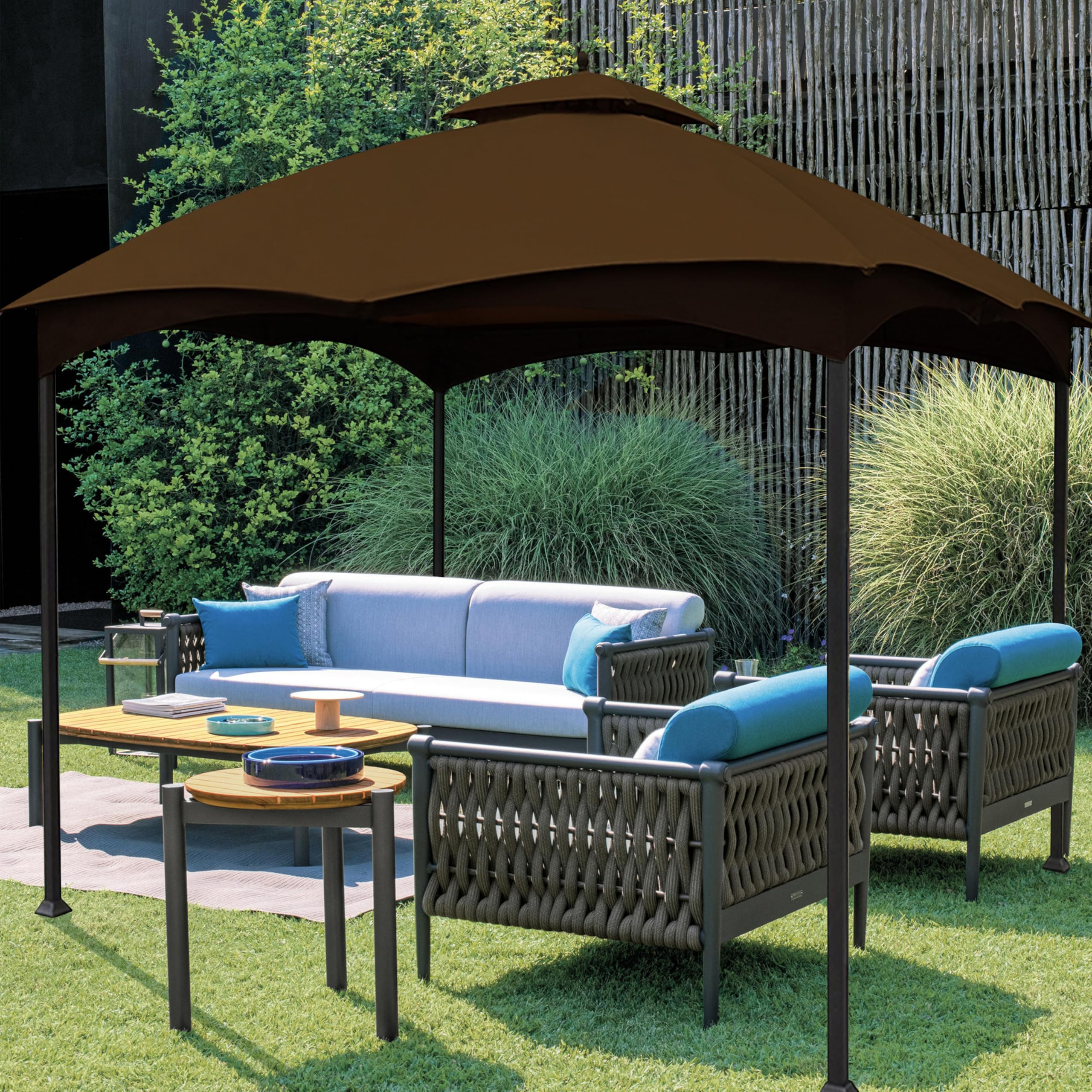 CoastShade canopy installed in backyard creating shaded seating and weather protection