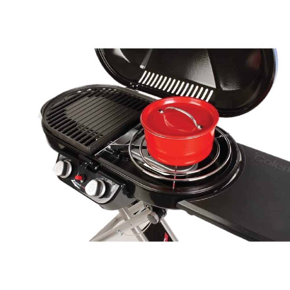 Coleman grate with 12-inch pan in use demonstrating cooking versatility benefit
