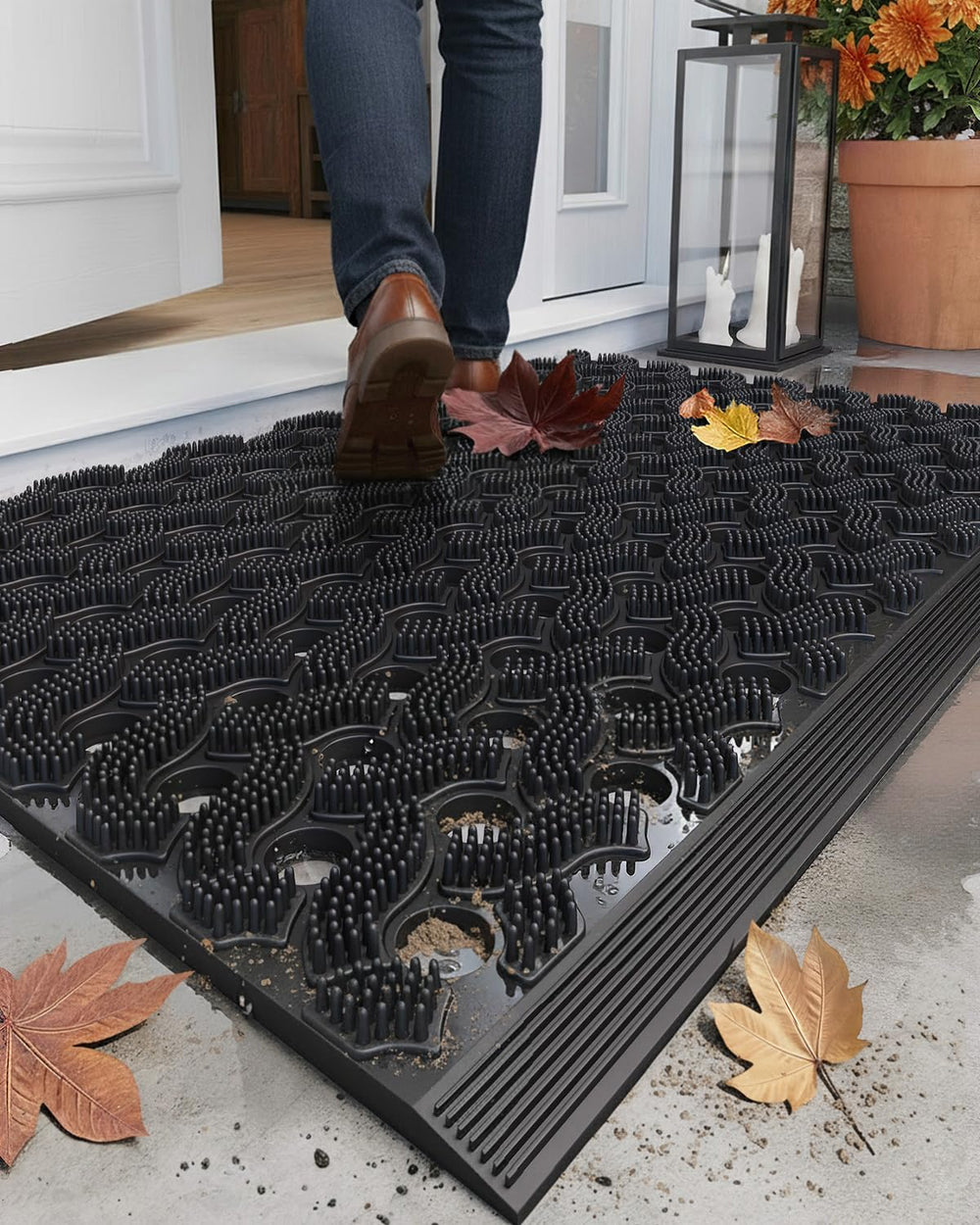 Color&Geometry front view of black heavyweight outdoor welcome mat showing stable fit