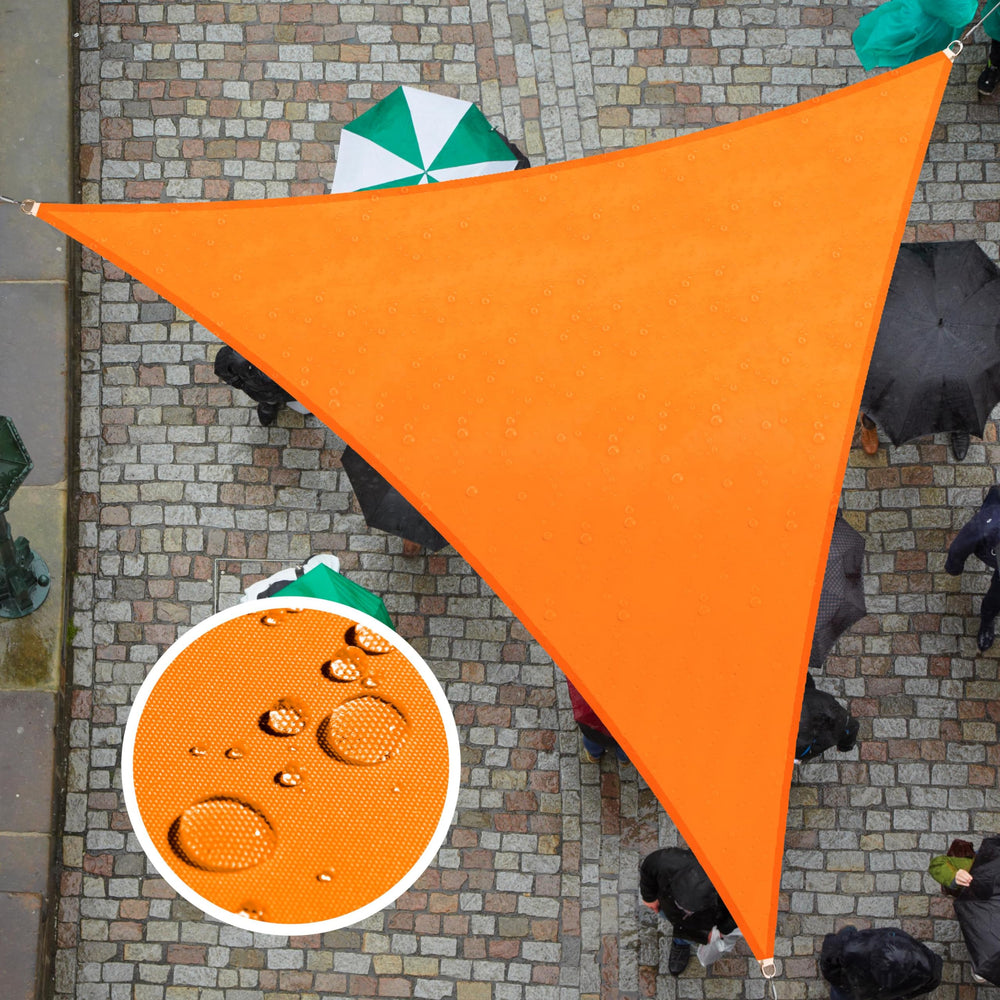 ColourTree front view of orange shade sail protecting patio furniture