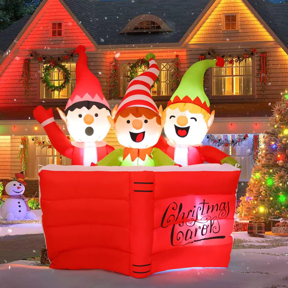 COMIN front view of 5 ft elf trio showing festive lawn impact