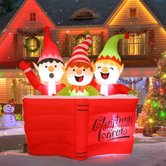 COMIN front view of 5 ft elf trio showing festive lawn impact