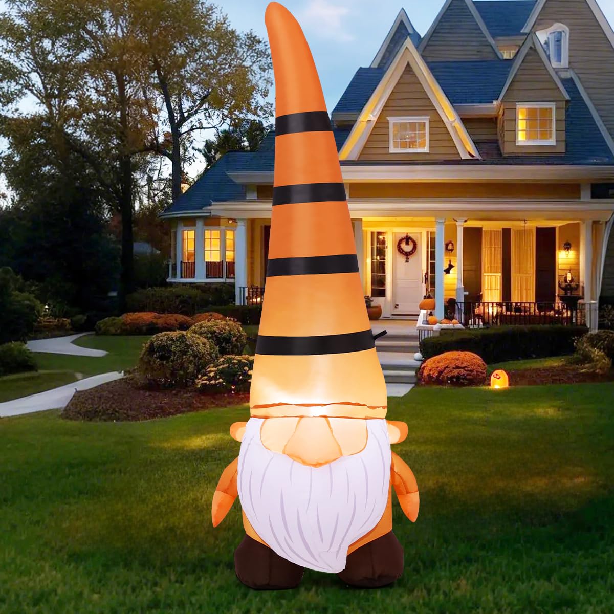 COMIN gnome beside doorway showing scale and welcoming entrance accent