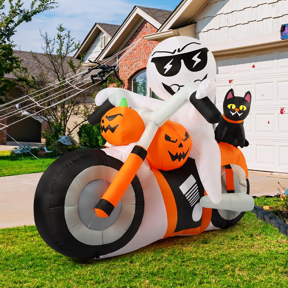 COMIN inflatable displayed on a front yard, creating festive Halloween atmosphere