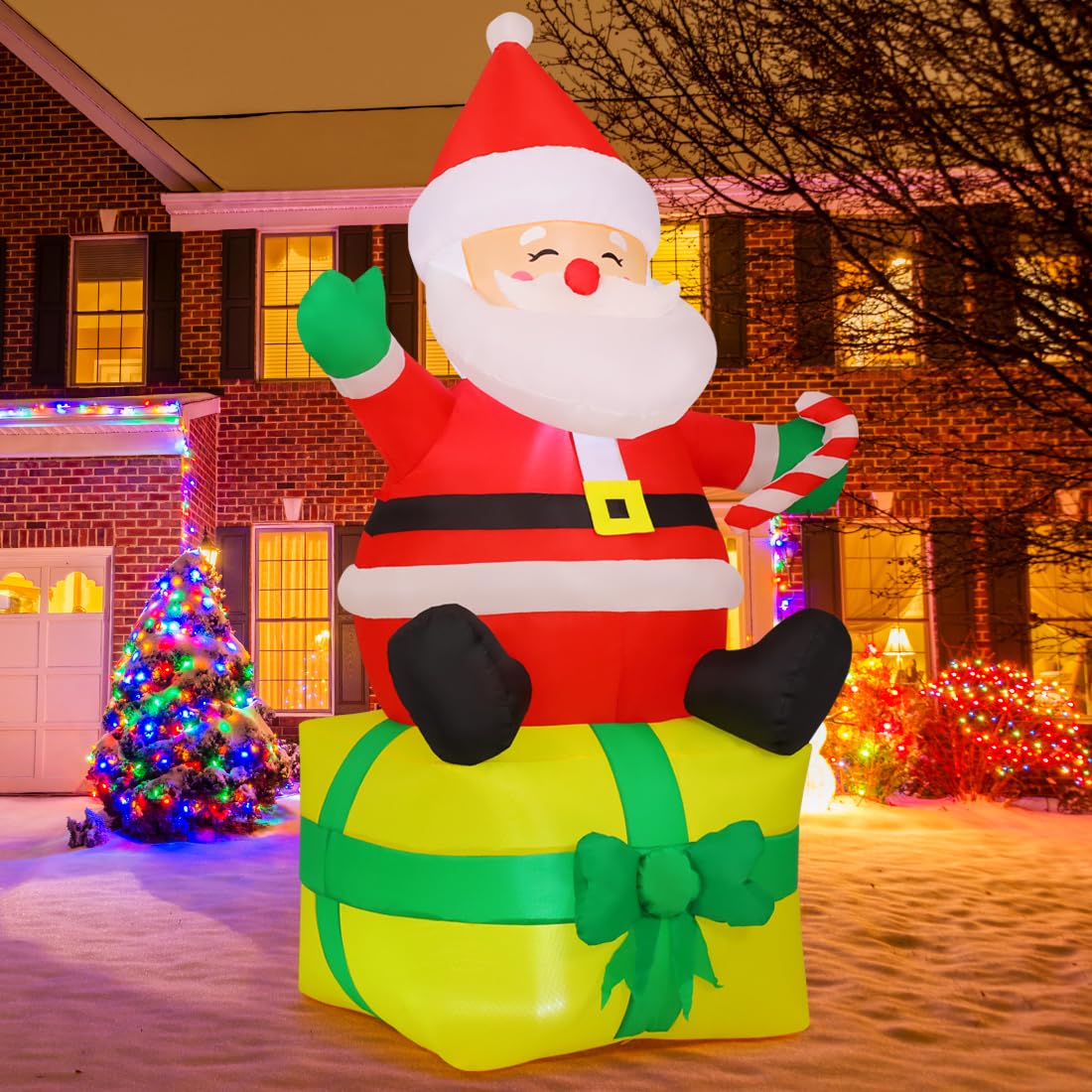 COMIN outdoor yard display with inflatable Santa creating holiday atmosphere