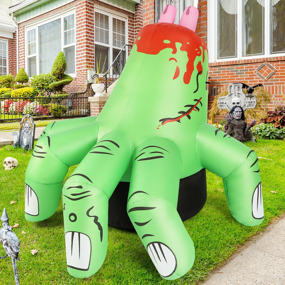 COMIN inflatable hand beside porch steps displaying 6ft scale for placement planning