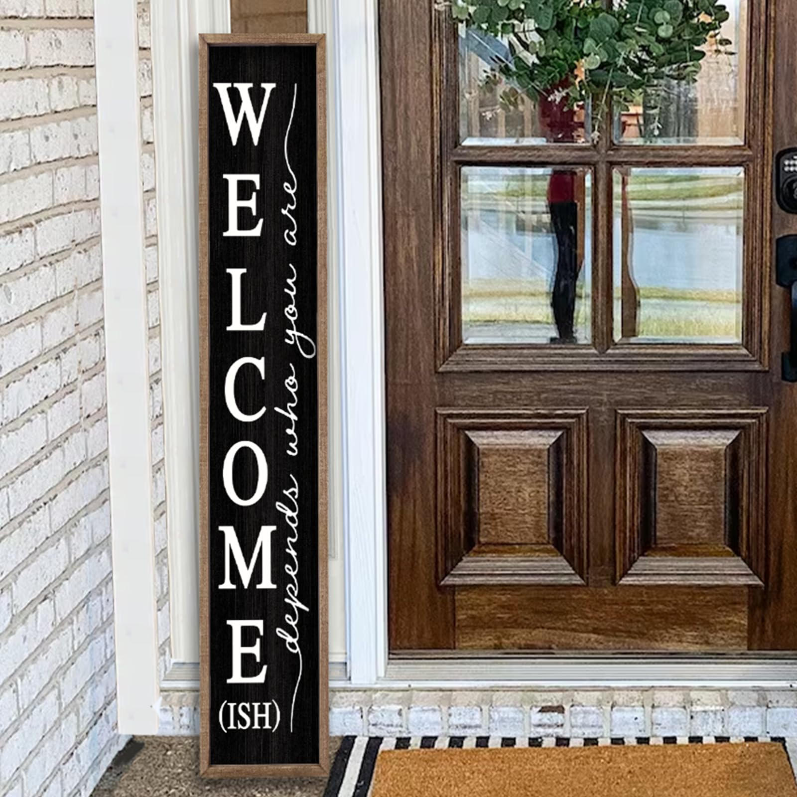 comurdyo Welcome-ish front view showing full black wood board and greeting, welcoming curb appeal
