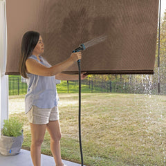 Coolaroo installed on a patio showing reduced glare and comfortable seating