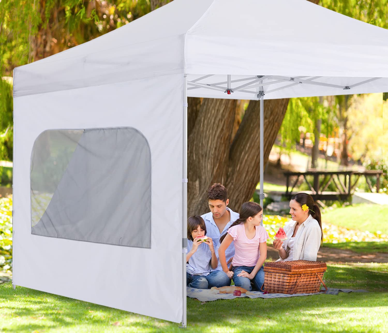 COOSHADE sidewall installed on backyard canopy providing privacy and shade