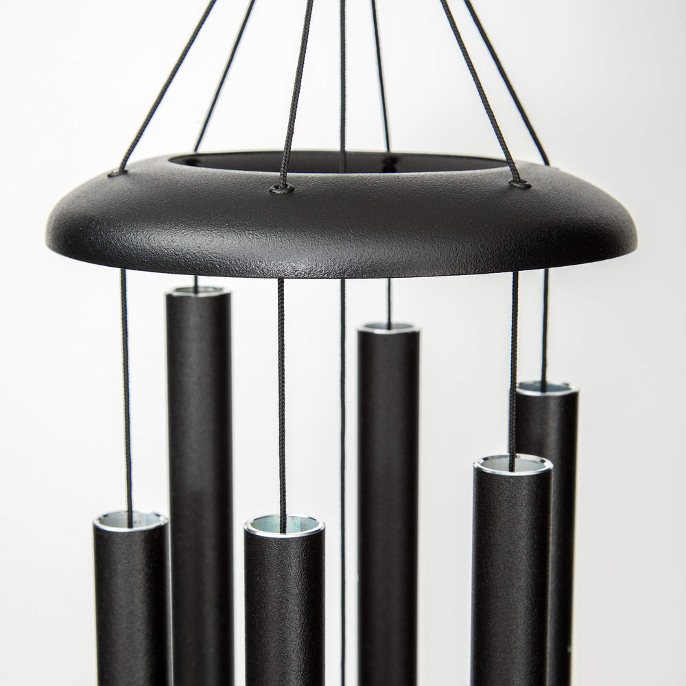Corinthian Bells hanging in garden showing modern decor and calming ambiance