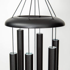 Corinthian Bells hanging in garden showing modern decor and calming ambiance