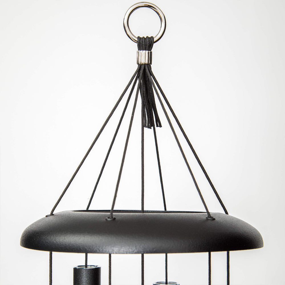 Corinthian Bells with tape measure showing 30-inch scale for size clarity