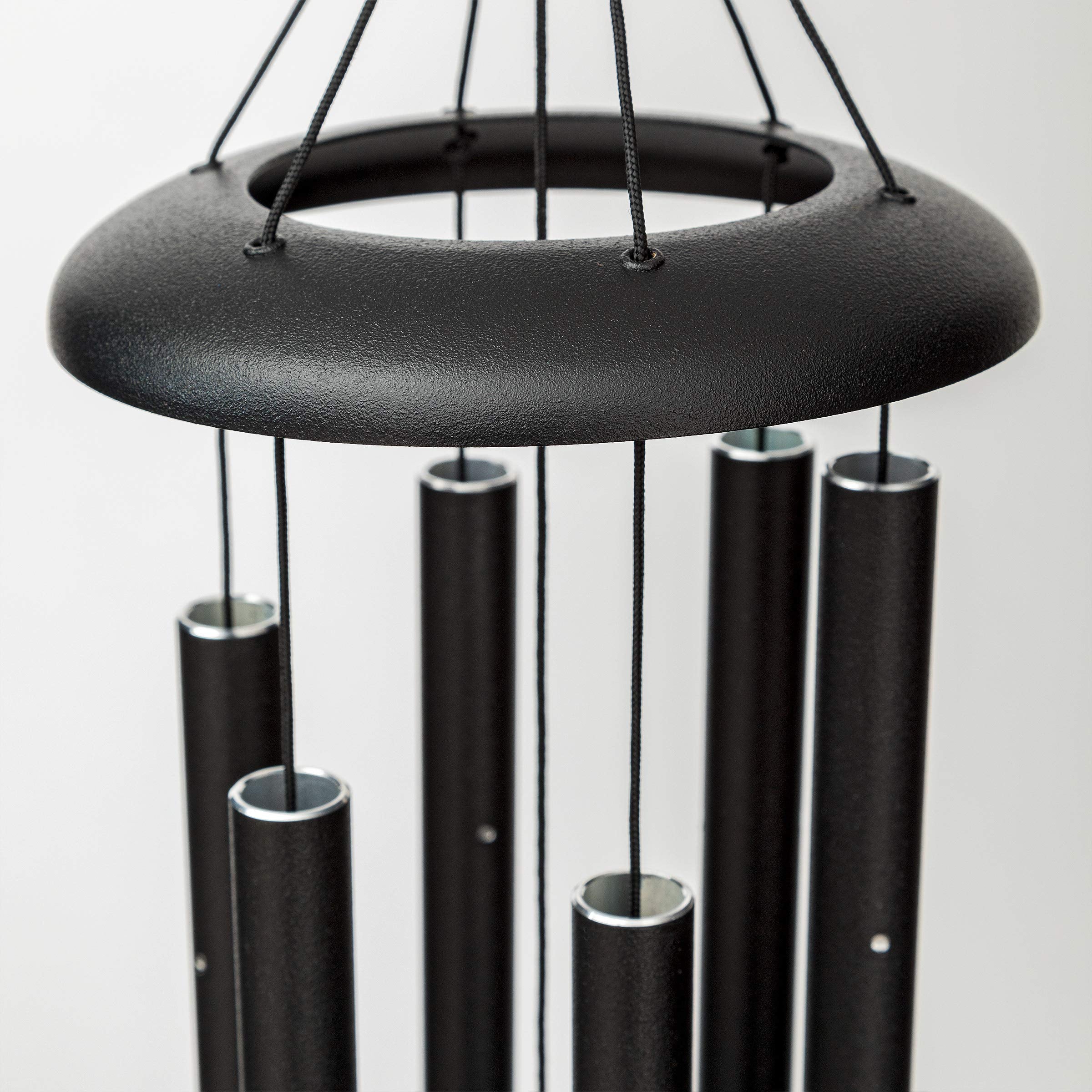 Corinthian Bells hanging on porch illustrating calming patio ambiance